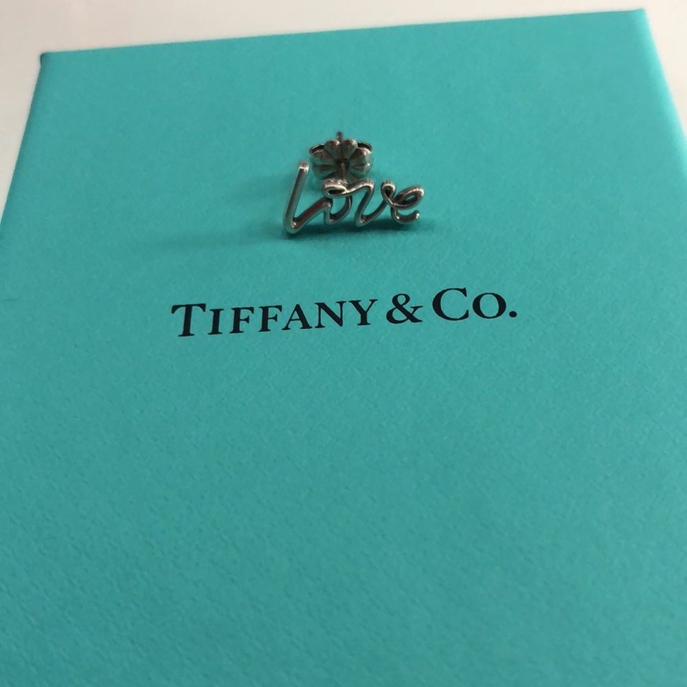 Tiffany & co , single earring statement "Love"